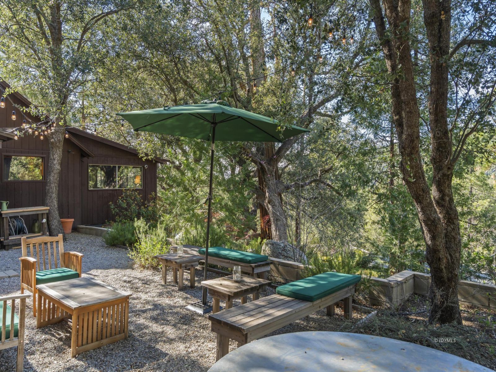 53241 Middleridge Drive Idyllwild, CA 92549 - Photo 40 of 48 a view of backyard with outdoor seating and trees