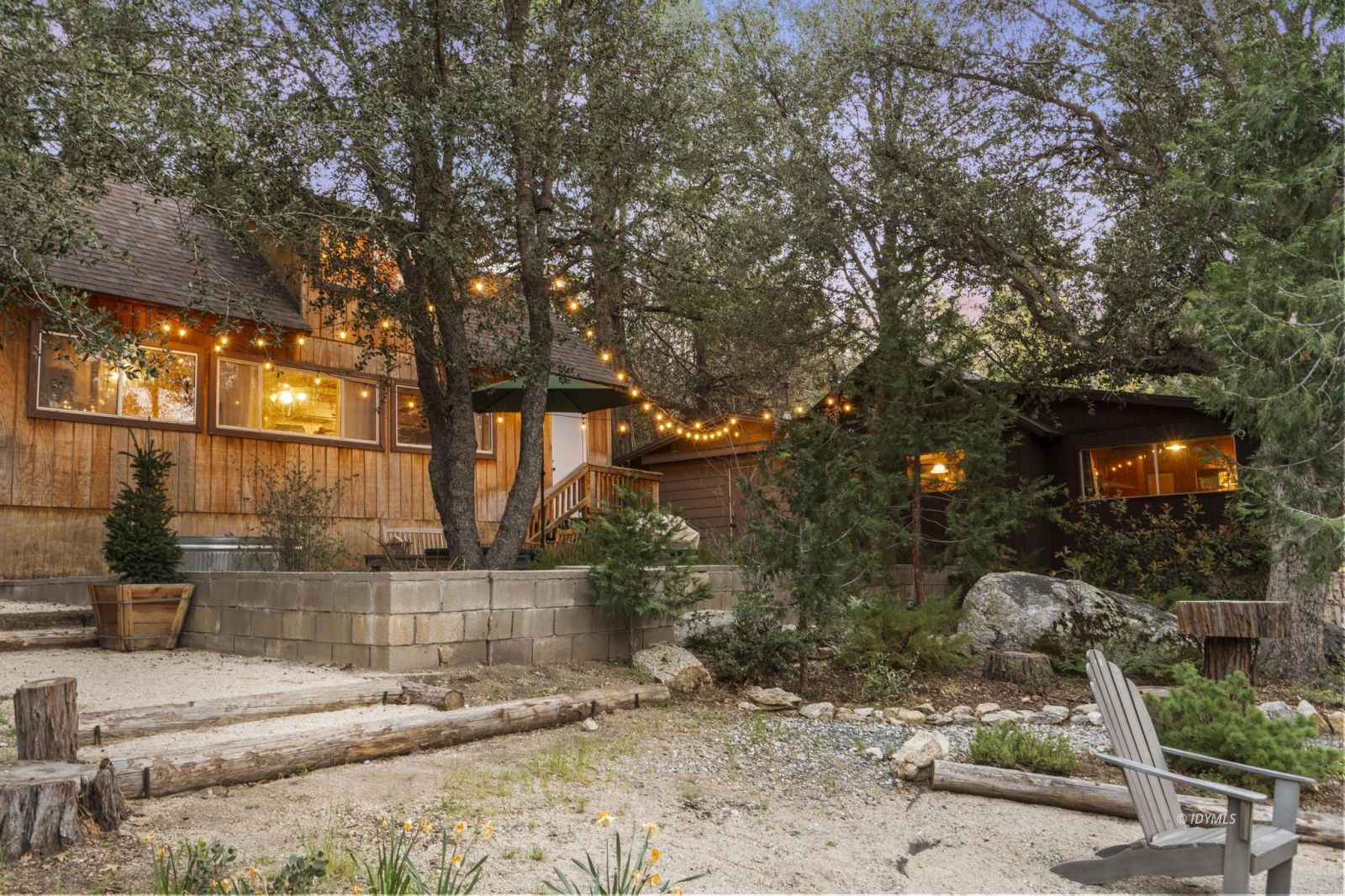 53241 Middleridge Drive Idyllwild, CA 92549 - Photo 4 of 48 a backyard of a house with lots of green space