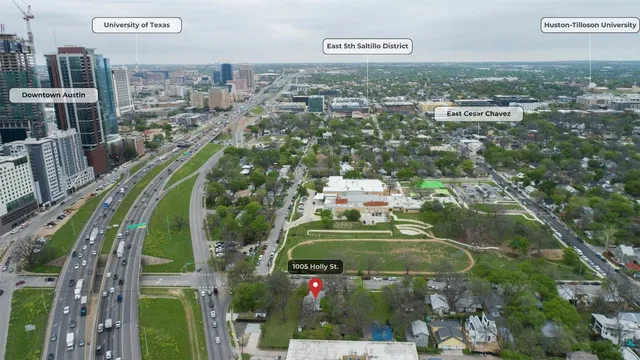 an aerial view of a city with lots of residential buildings