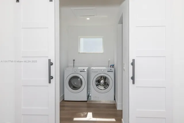 a utility room with dryer and washer