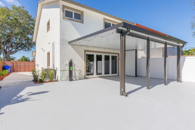 a front view of a house with a garage