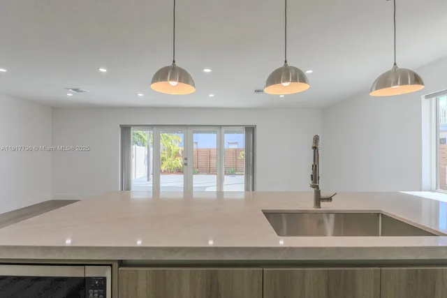 a room with a sink and a window