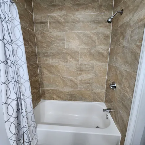 a bathroom with a bathtub