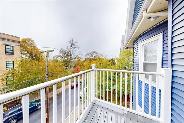 a view of a balcony with an outdoor space