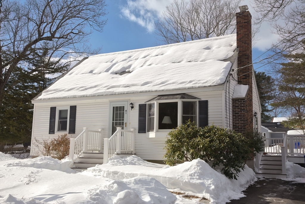 41 Taylor Road Maynard, MA 01754 - Photo 2 of 27 a view of a house with a snow in the yard