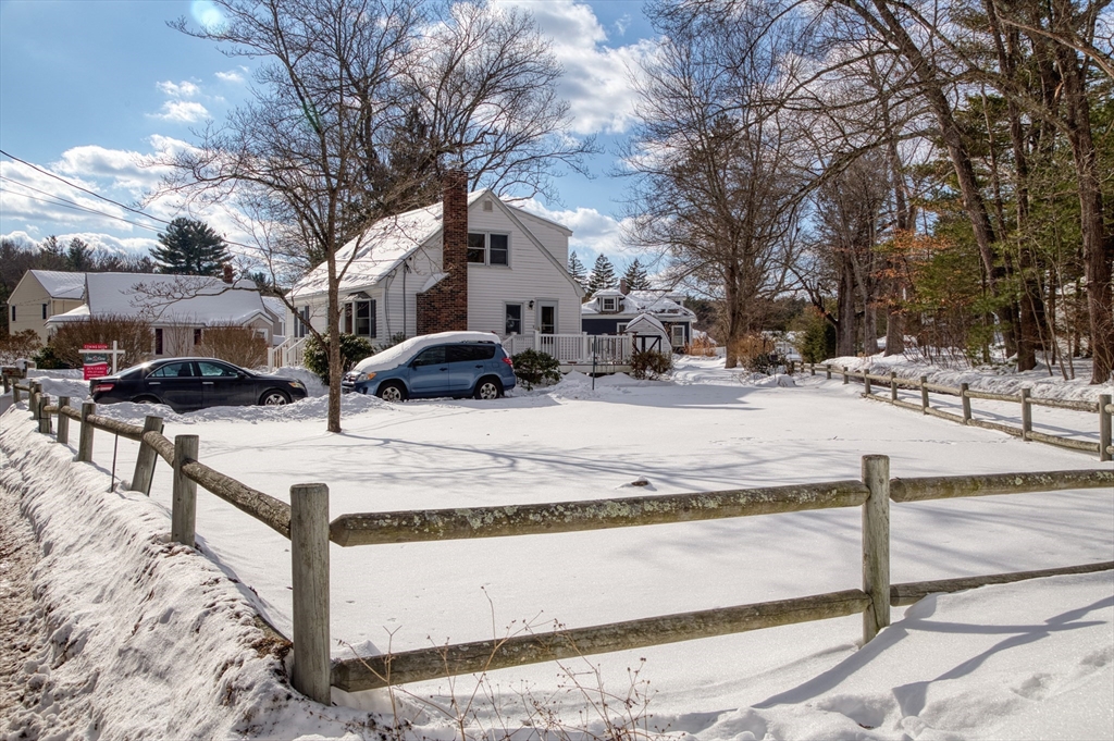 41 Taylor Road Maynard, MA 01754 - Photo 25 of 27 a view of street with a bench