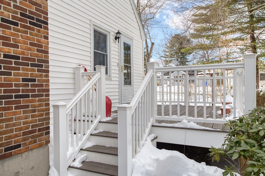 41 Taylor Road Maynard, MA 01754 - Photo 4 of 27 a view of a balcony with two chairs