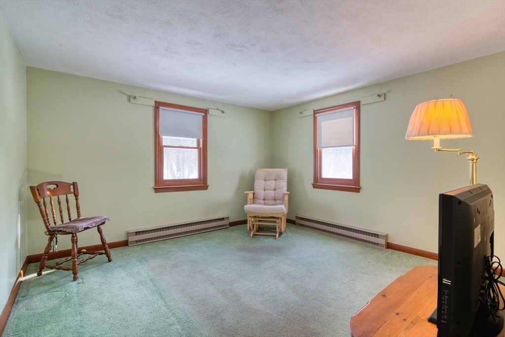 41 Taylor Road Maynard, MA 01754 - Photo 8 of 27 a living room with furniture and a window