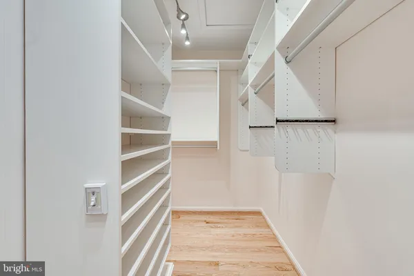 a view of an empty walk in closet