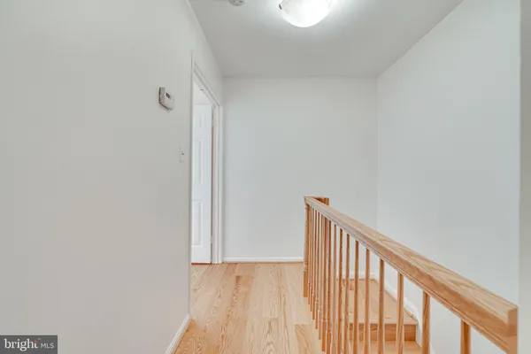 a backyard of a house with wooden floor
