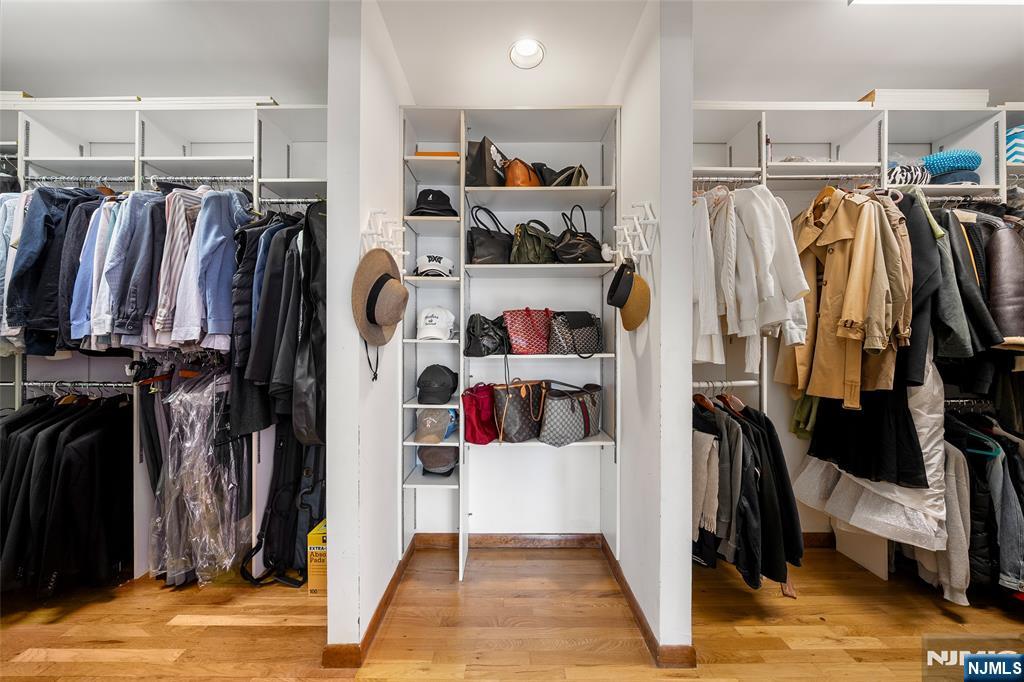 19 Central Avenue Demarest, NJ 07627 - Photo 22 of 49 a walk in closet with clothes and shoes