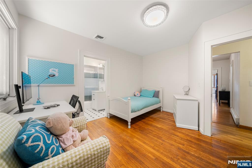 19 Central Avenue Demarest, NJ 07627 - Photo 26 of 49 a living room with furniture and a wooden floor