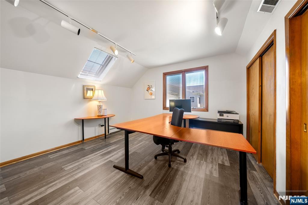 19 Central Avenue Demarest, NJ 07627 - Photo 33 of 49 a view of a workspace with furniture and a window