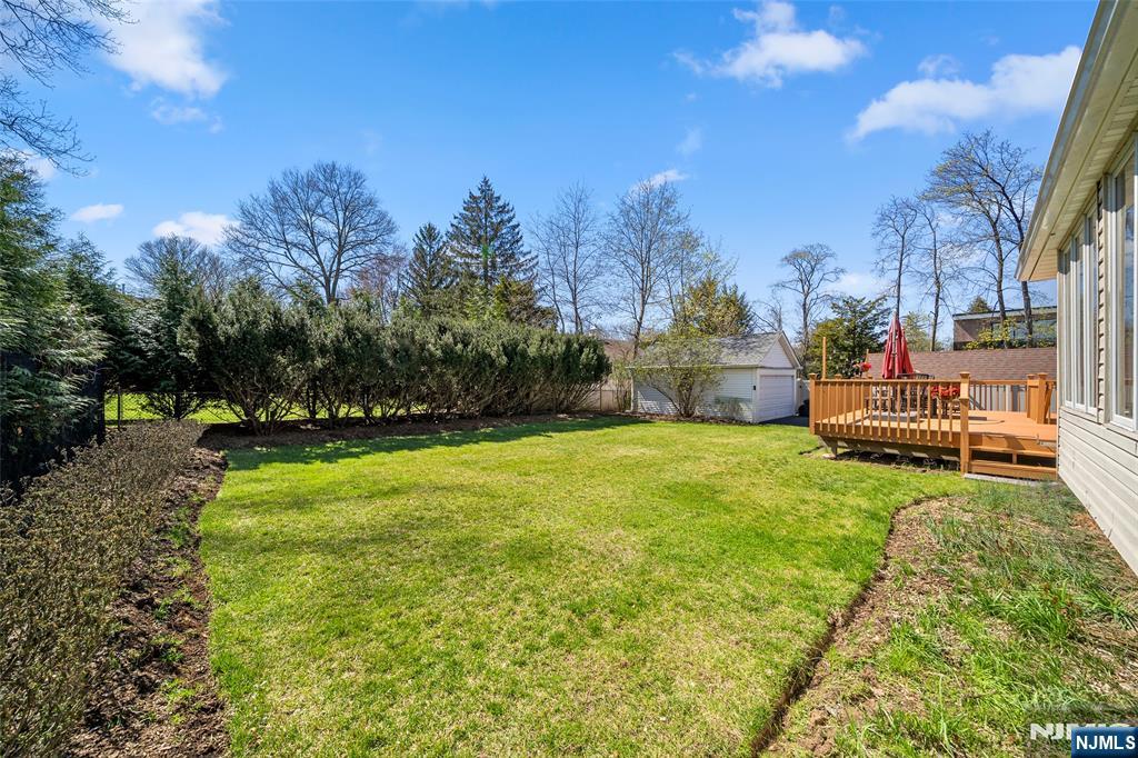 19 Central Avenue Demarest, NJ 07627 - Photo 42 of 49 a view of a house with backyard and sitting area