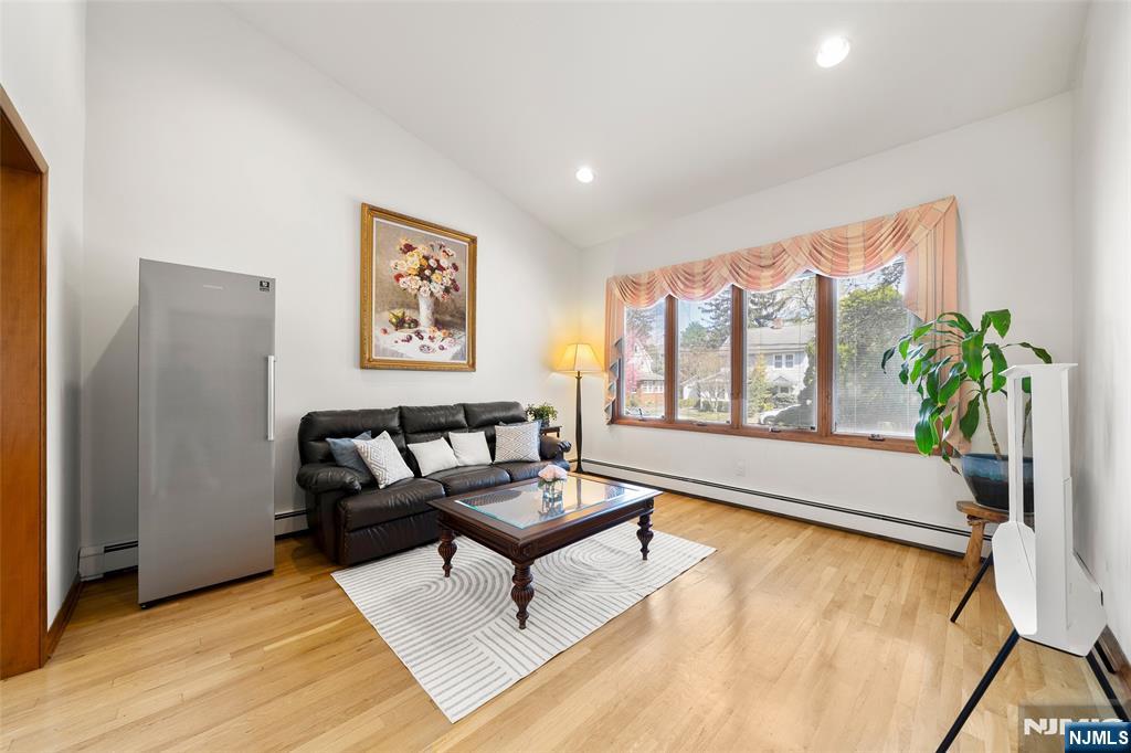 19 Central Avenue Demarest, NJ 07627 - Photo 7 of 49 a living room with furniture and a large window