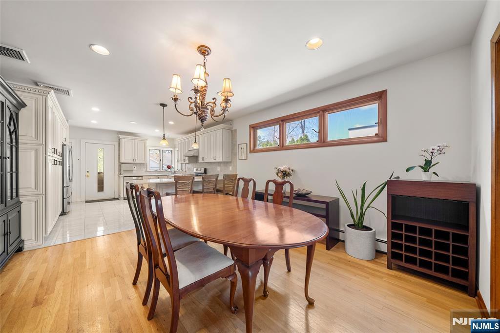 19 Central Avenue Demarest, NJ 07627 - Photo 10 of 49 a view of a dining room with furniture and wooden floor