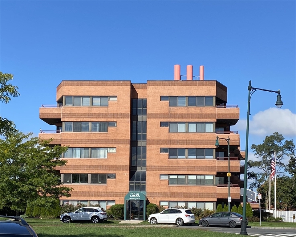 1 Carey Circle, Unit 108 Revere, MA 02151 - Photo 1 of 19 a front view of a building