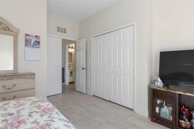 a bathroom with a granite countertop sink a vanity and a mirror