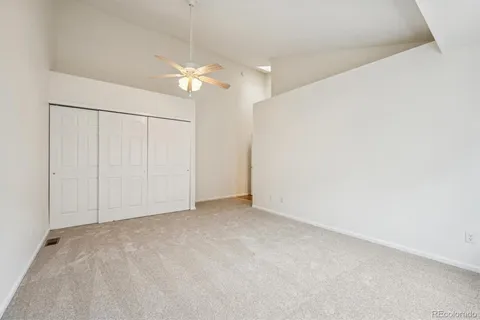 an empty room with fan