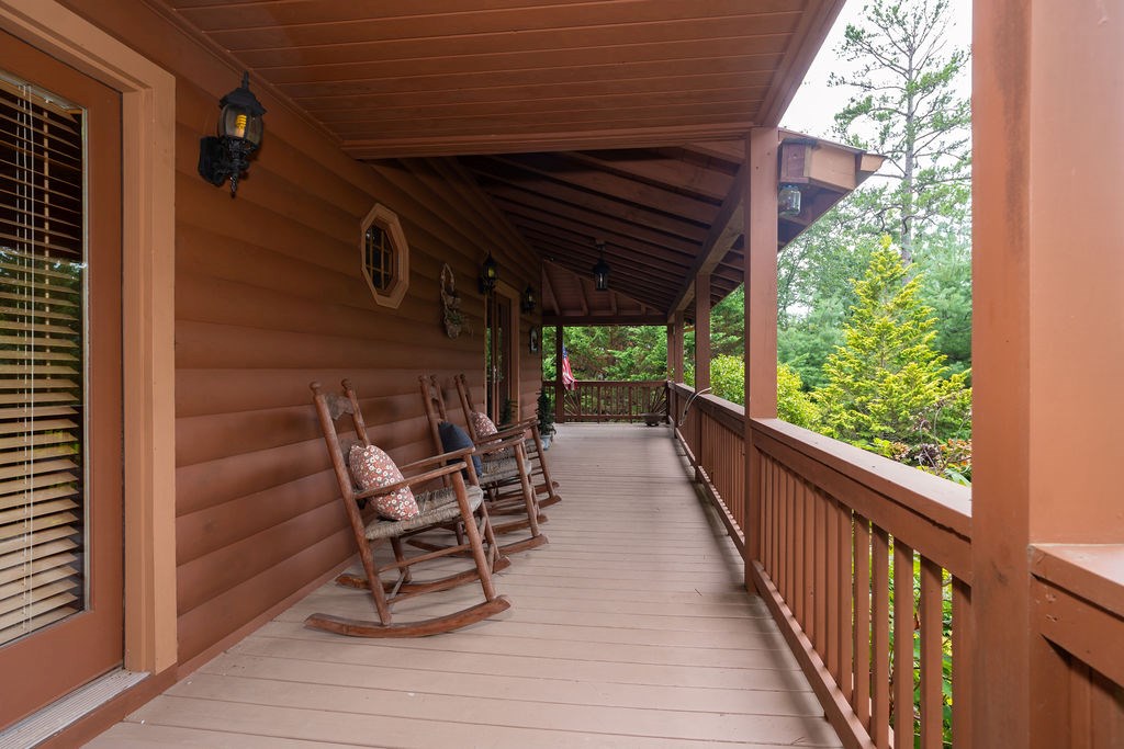 120 Foxfire Road Blue Ridge, GA 30513 - Photo 16 of 55 a view of a chairs and table in the balcony