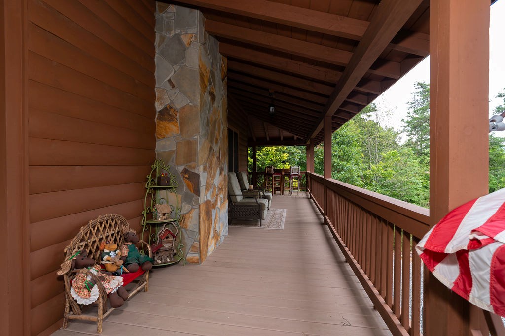 120 Foxfire Road Blue Ridge, GA 30513 - Photo 23 of 55 a view of a porch with furniture