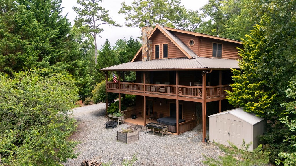 120 Foxfire Road Blue Ridge, GA 30513 - Photo 26 of 55 a view of a house with a yard and wooden fence