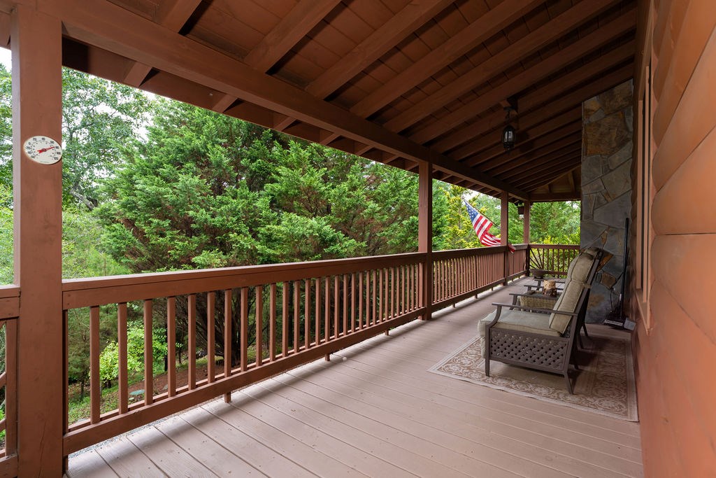 120 Foxfire Road Blue Ridge, GA 30513 - Photo 31 of 55 a view of a chair and table in the balcony