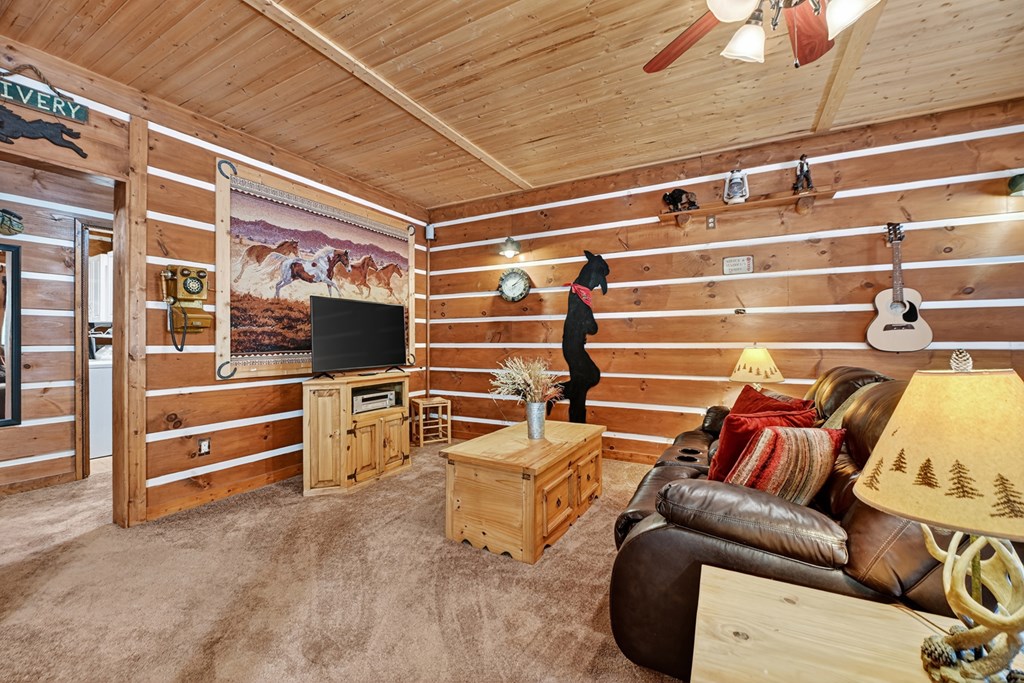 120 Foxfire Road Blue Ridge, GA 30513 - Photo 49 of 55 a view of walk in closet with clothes and shoes