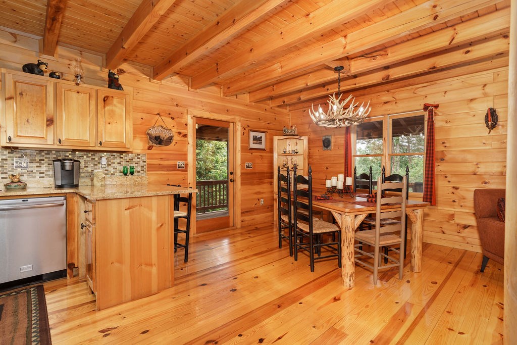 120 Foxfire Road Blue Ridge, GA 30513 - Photo 7 of 55 a view of a dining room with furniture and wooden floor
