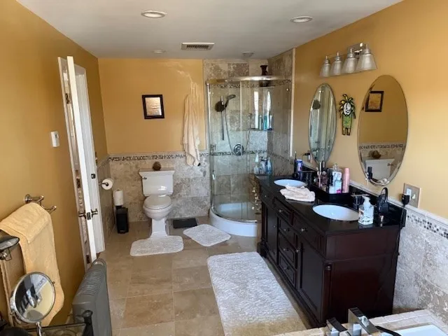 a kitchen with sink cabinets and wooden floor