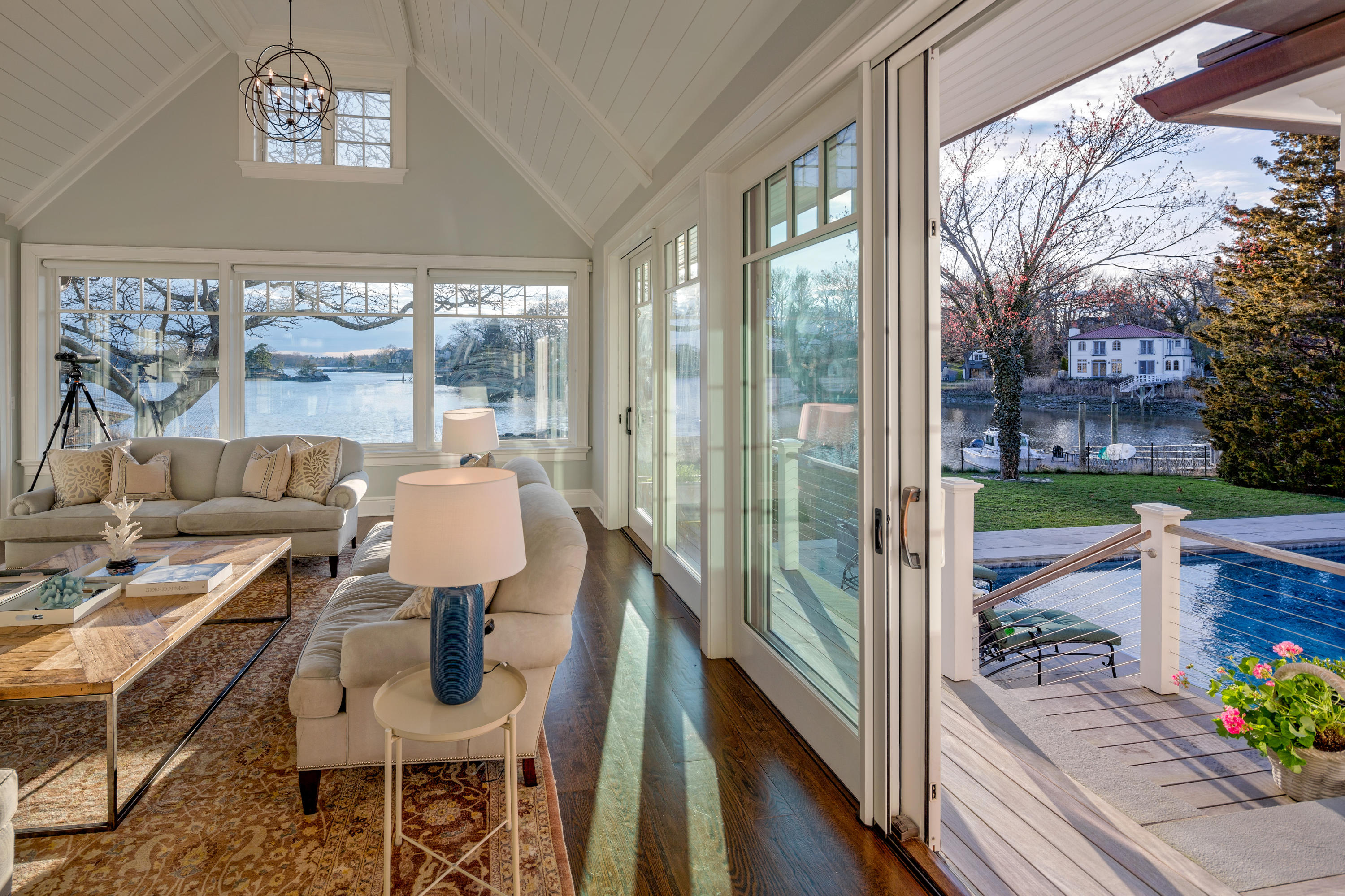 6 Contentment Island Road Darien, CT 06820 - Photo 13 of 40 a view of a balcony dining area with furniture