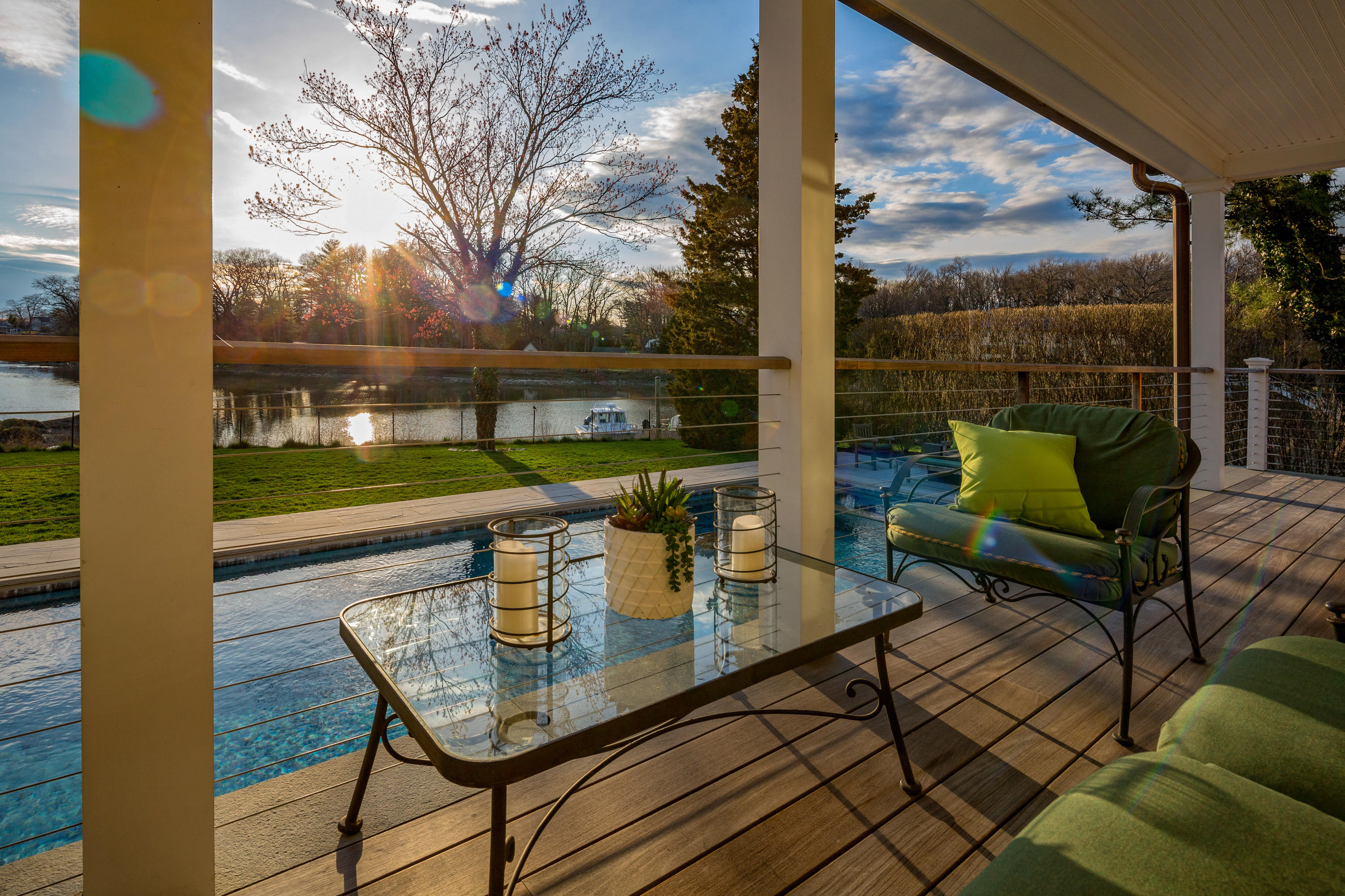 6 Contentment Island Road Darien, CT 06820 - Photo 14 of 40 a view of deck with furniture and garden