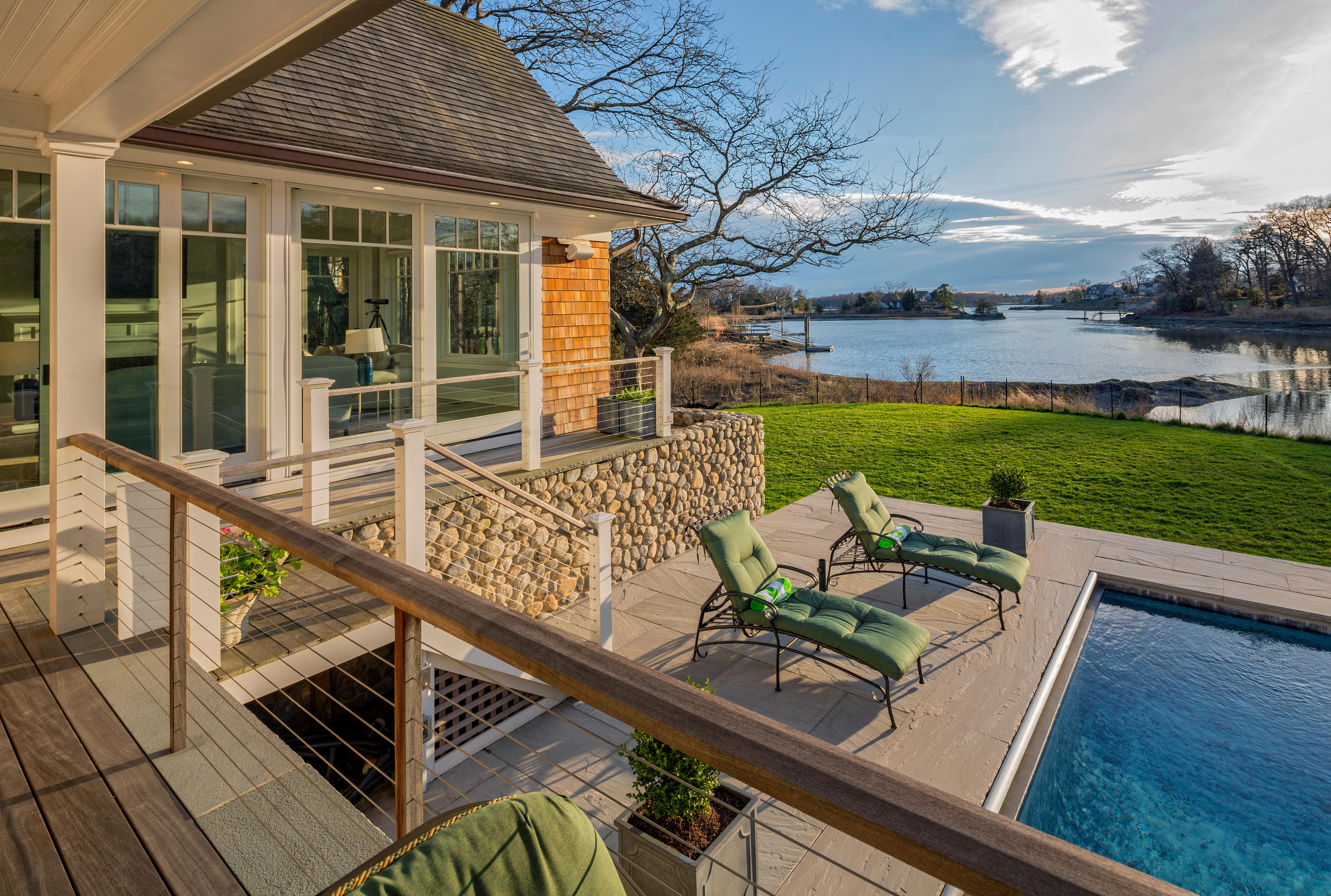 6 Contentment Island Road Darien, CT 06820 - Photo 16 of 40 a view of a backyard with sitting area