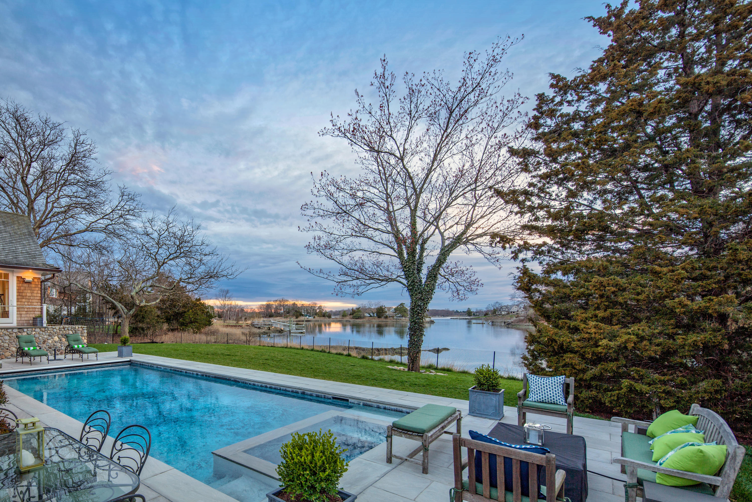 6 Contentment Island Road Darien, CT 06820 - Photo 17 of 40 a view of a swimming pool with a patio