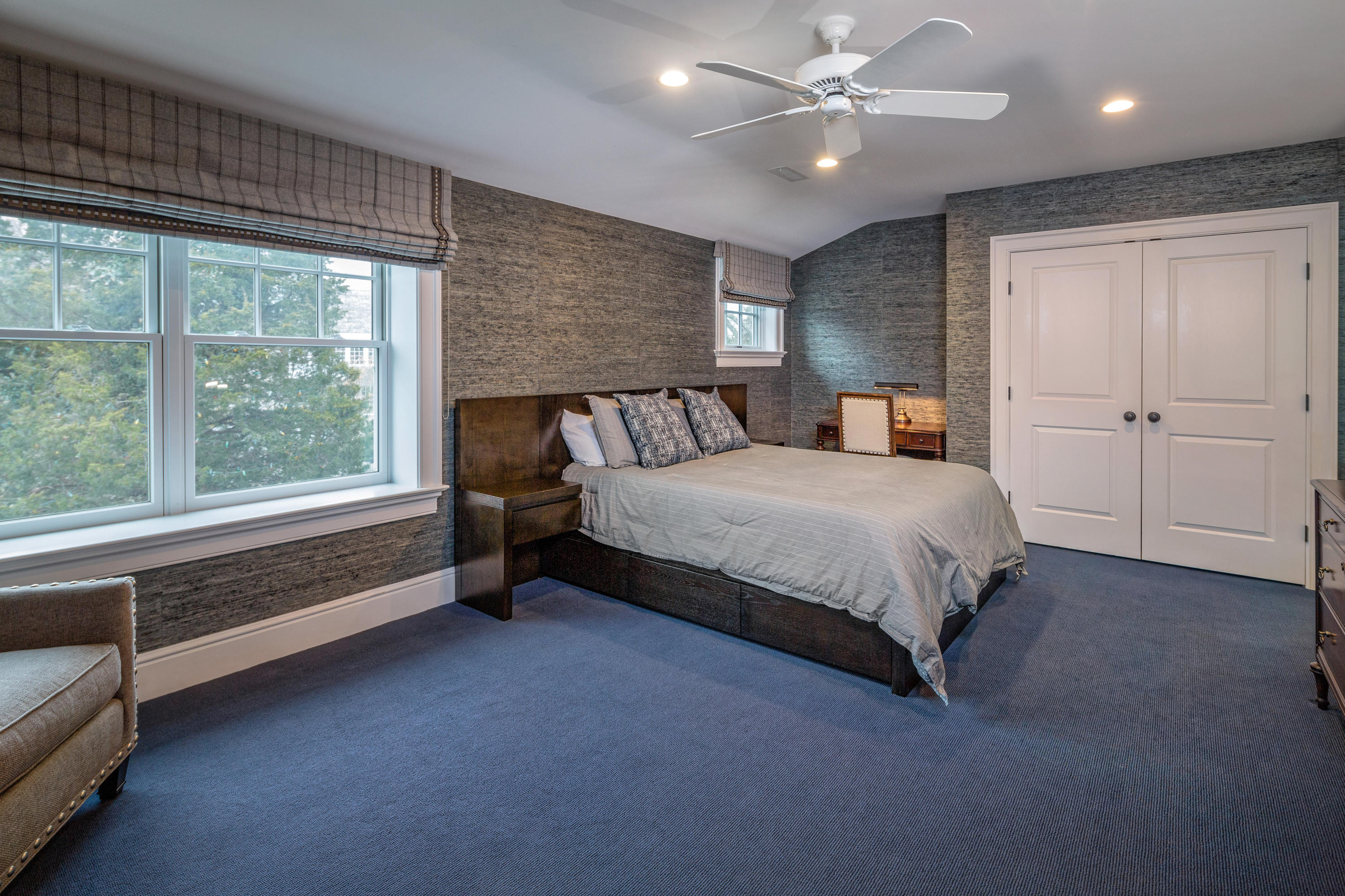 6 Contentment Island Road Darien, CT 06820 - Photo 30 of 40 a bedroom with a bed and a large window