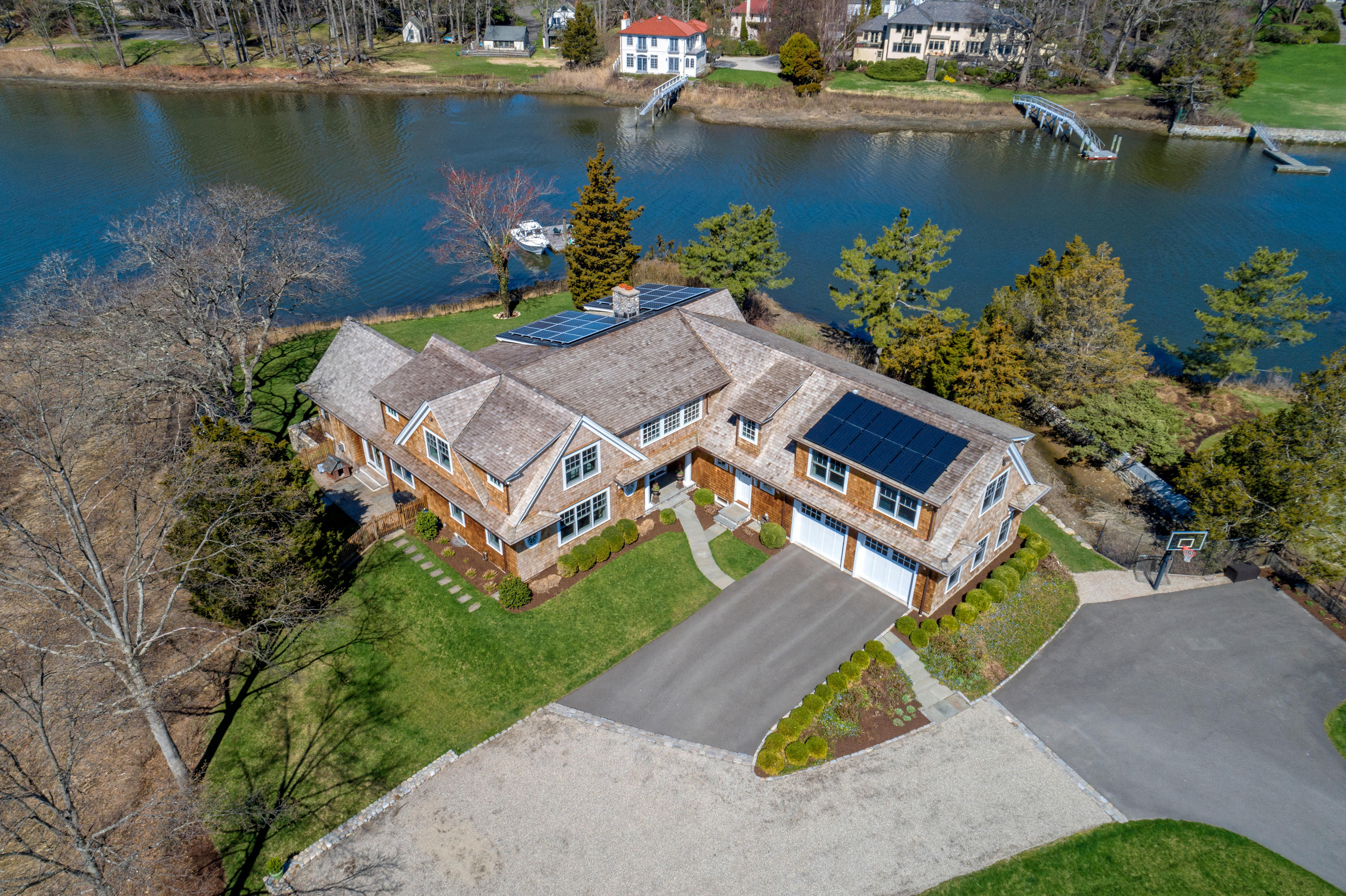 6 Contentment Island Road Darien, CT 06820 - Photo 38 of 40 an aerial view of a house with a lake view