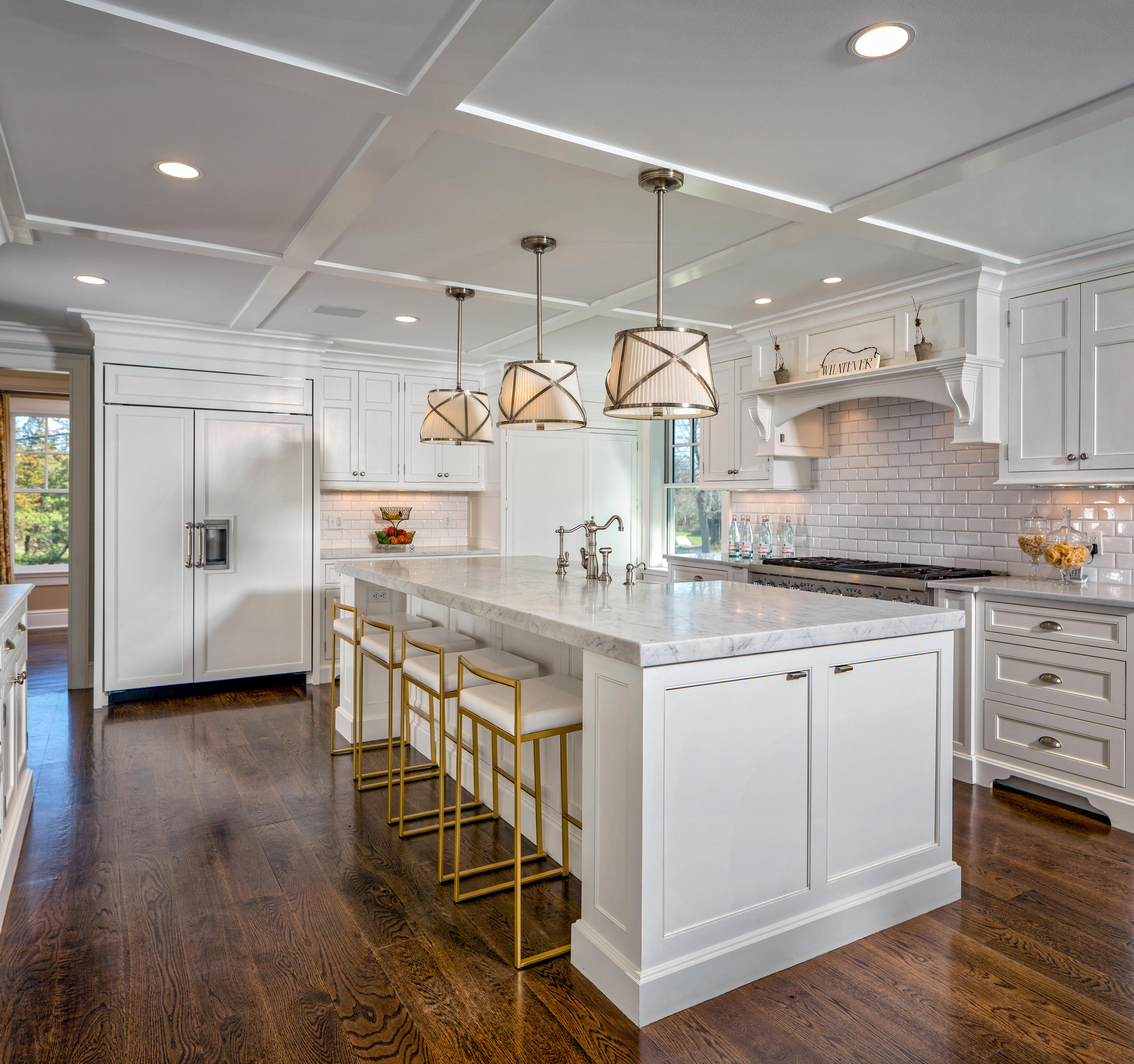 6 Contentment Island Road Darien, CT 06820 - Photo 9 of 40 a kitchen with stainless steel appliances kitchen island granite countertop a stove a sink and a refrigerator