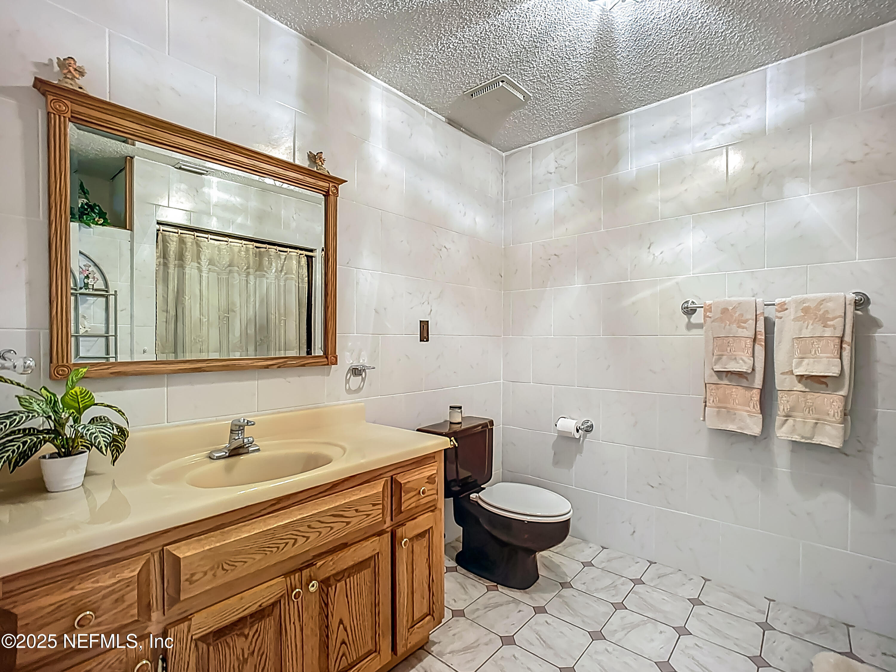 26504 Sheared Stokes Road Hilliard, FL 32046 - Photo 15 of 59 Entry Hall Bathroom 2