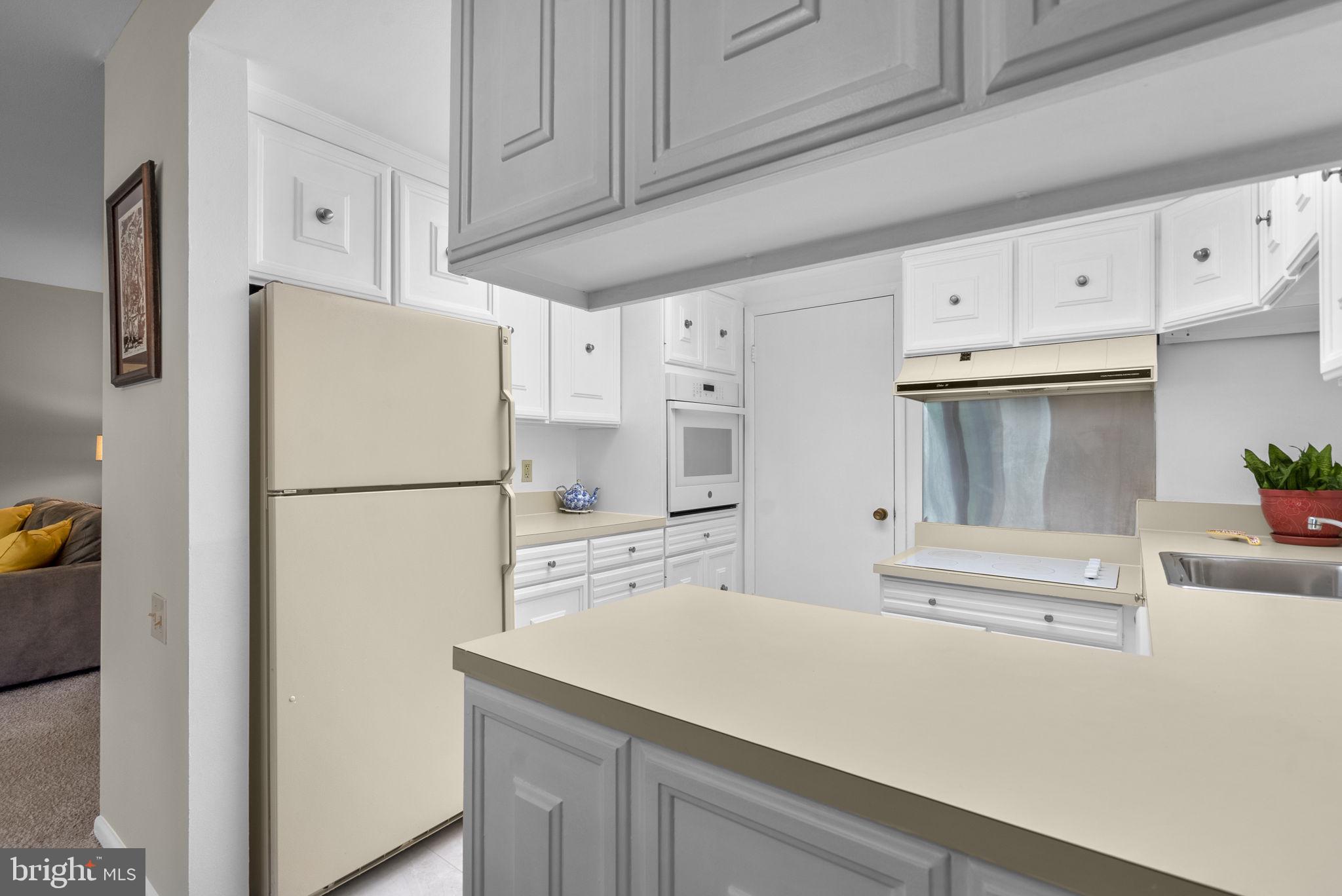 3382 Chiswick Court, Unit 512D Silver Spring, MD 20906 - Photo 12 of 50 Entry to the kitchen from the dining room!