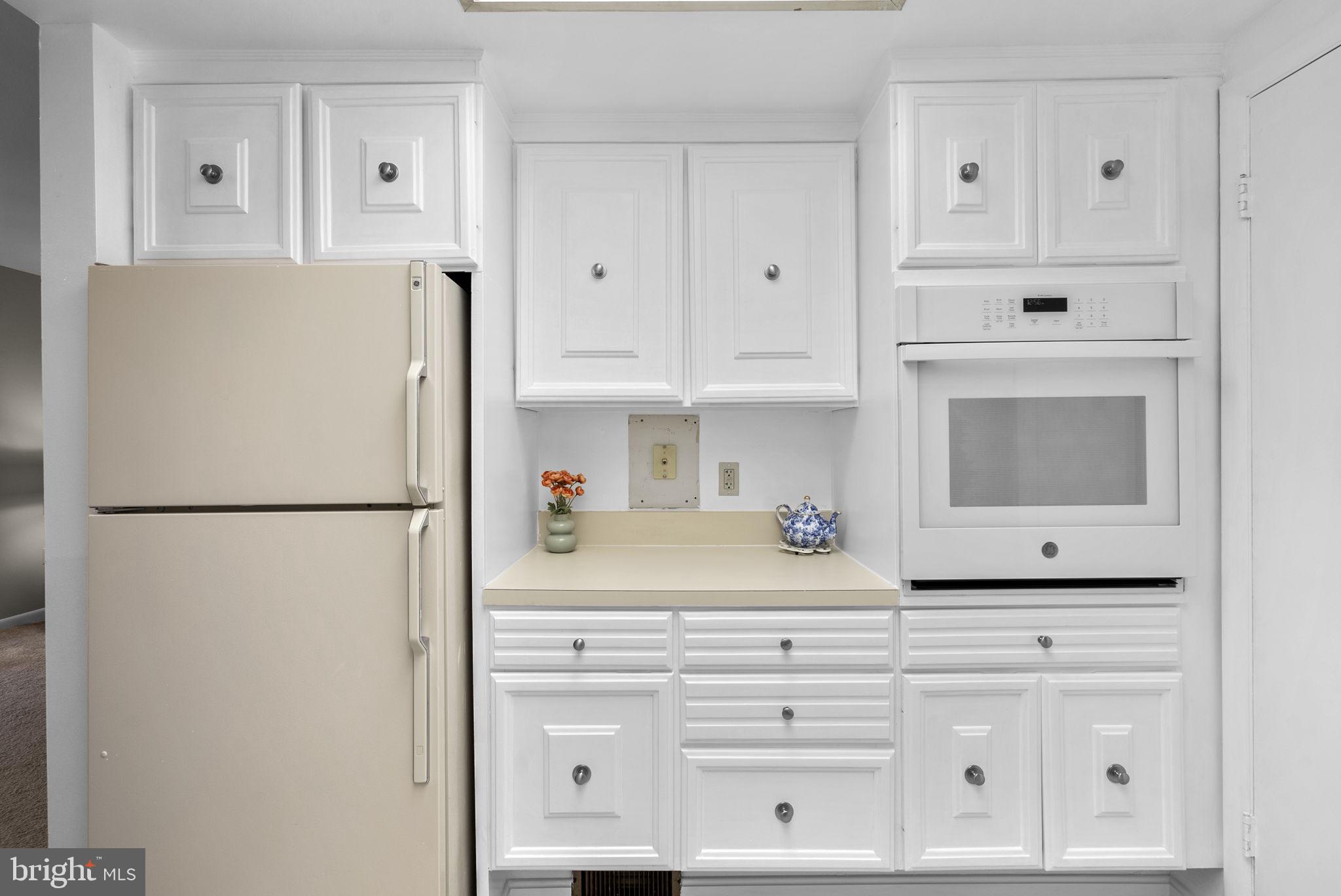 3382 Chiswick Court, Unit 512D Silver Spring, MD 20906 - Photo 15 of 50 Wall oven, fridge, and extra cabinetry!