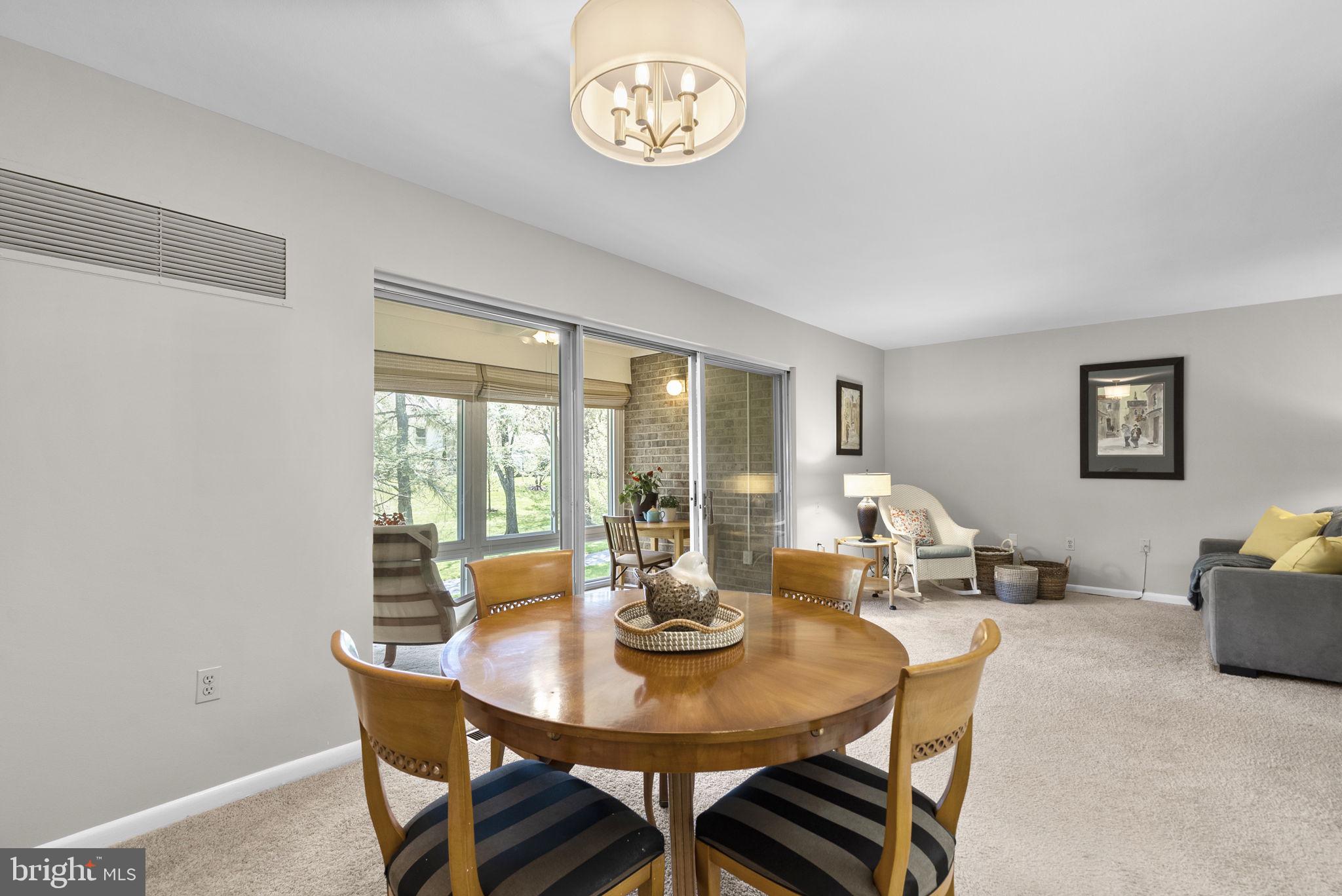3382 Chiswick Court, Unit 512D Silver Spring, MD 20906 - Photo 7 of 50 Dining room opens to the sun room and living room!