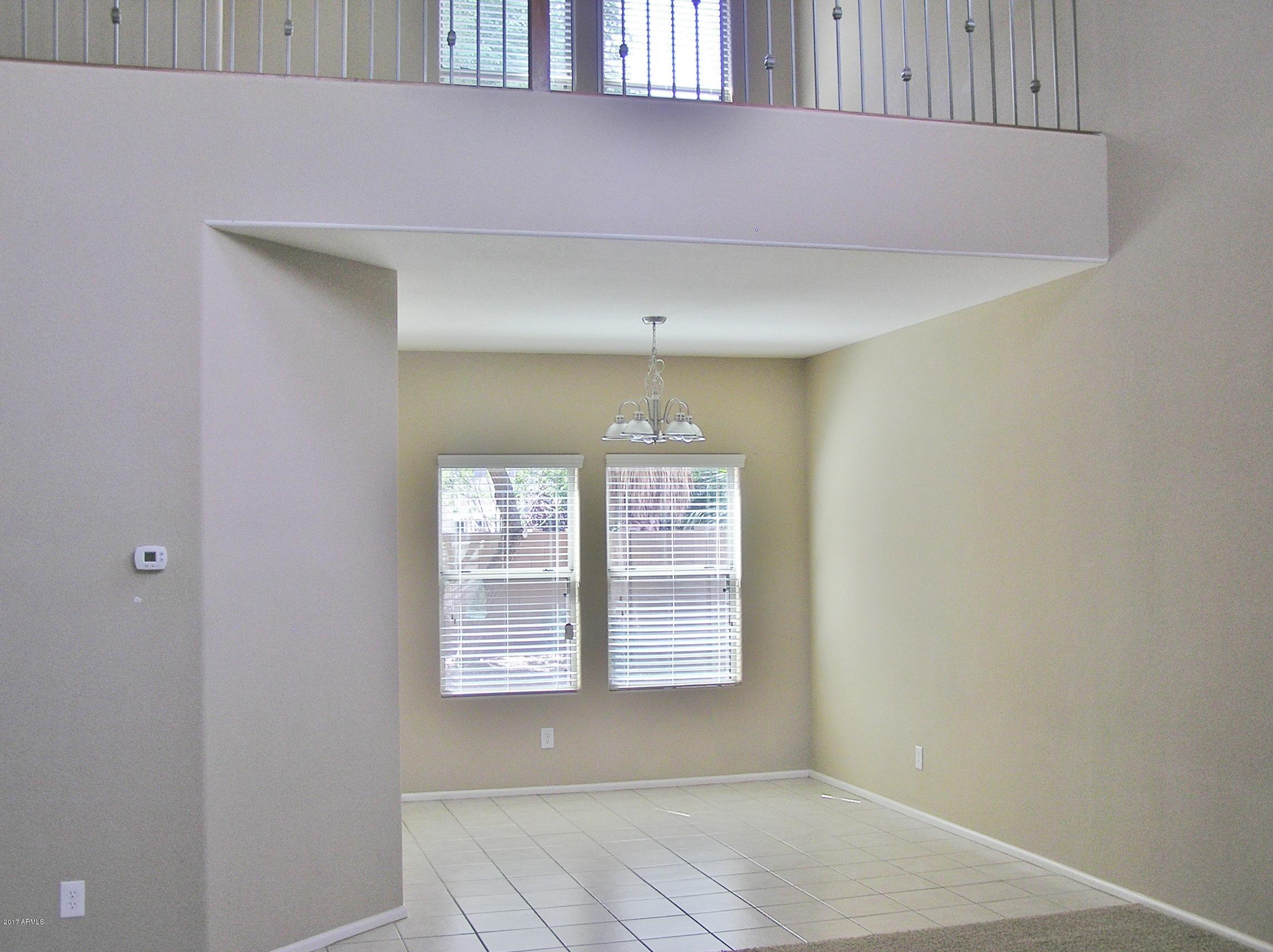 4231 East Bonanza Road Gilbert, AZ 85297 - Photo 11 of 62 DINING ROOM WITH LOFT ABOVE