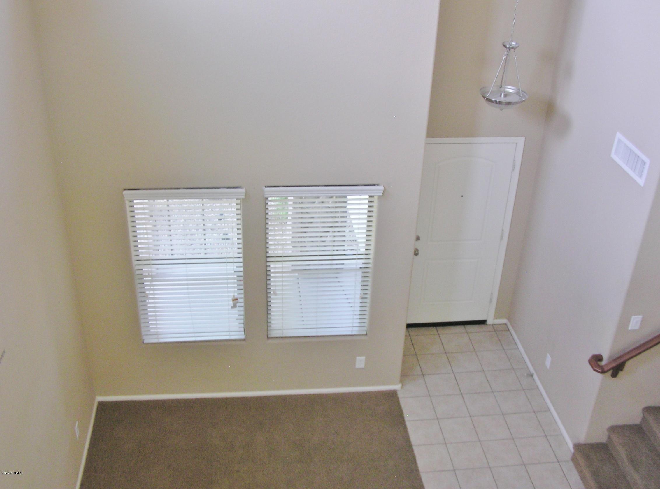 4231 East Bonanza Road Gilbert, AZ 85297 - Photo 19 of 62 LOOKING DOWN ON LIVING ROOM