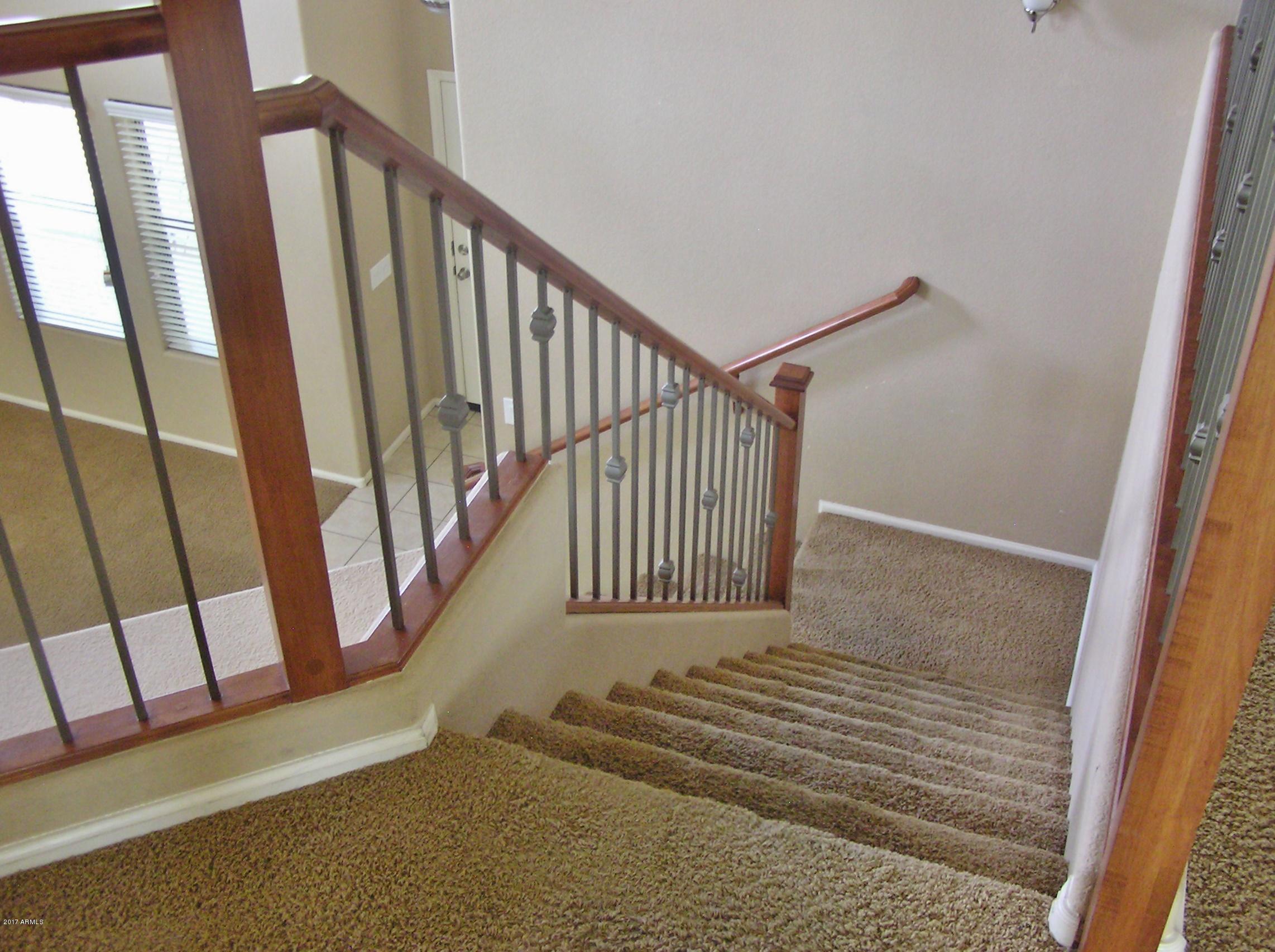 4231 East Bonanza Road Gilbert, AZ 85297 - Photo 20 of 62 LOOKING DOWN THE STAIR CASE