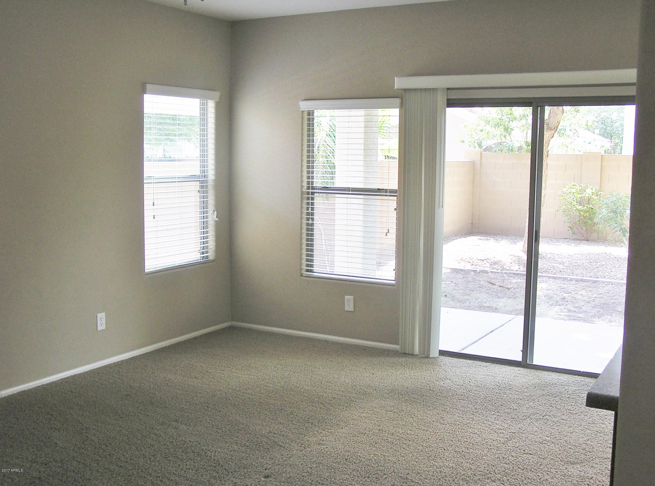 4231 East Bonanza Road Gilbert, AZ 85297 - Photo 27 of 62 FAMILY ROOM WITH DOOR TO PATIO
