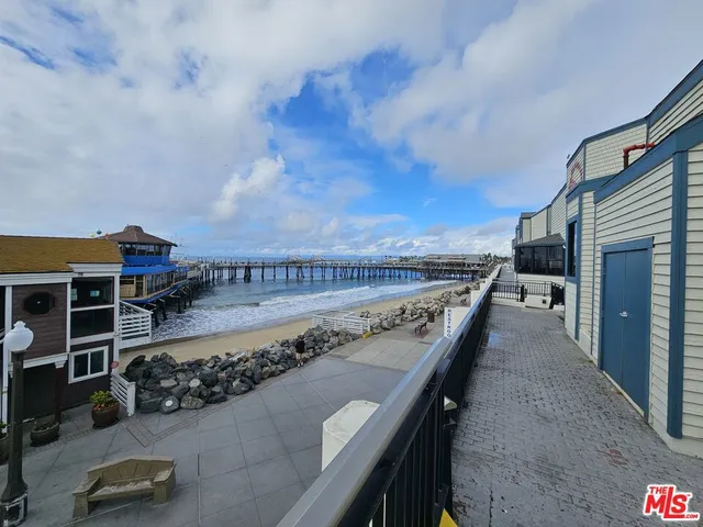 a view of a balcony with an ocean view