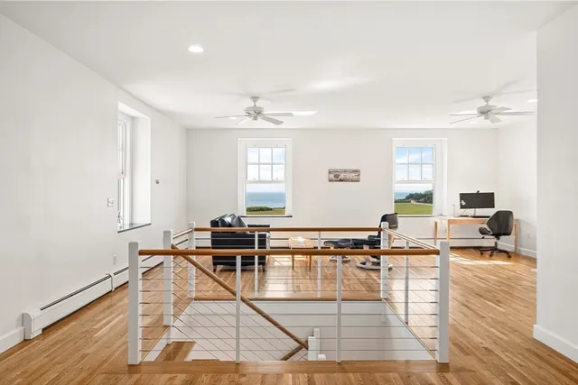 a view of a living room and kitchen floor