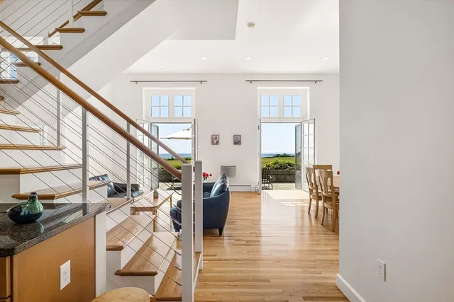 a view of entryway with wooden floor