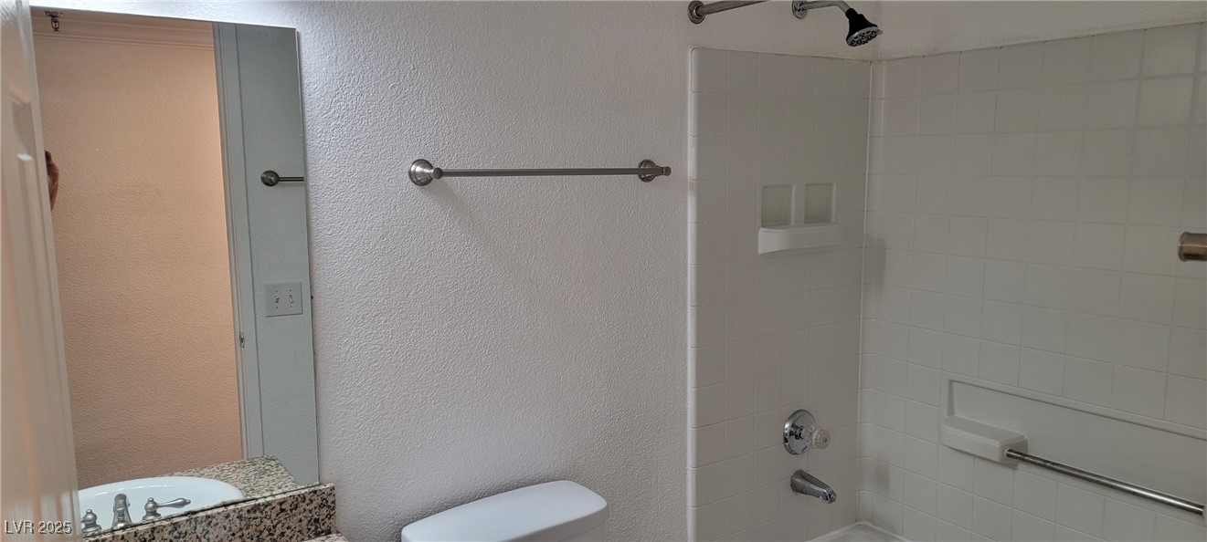 2750 South Durango Drive, Unit 1072 Las Vegas, NV 89117 - Photo 13 of 23 Bathroom with shower / bathtub combination, a text