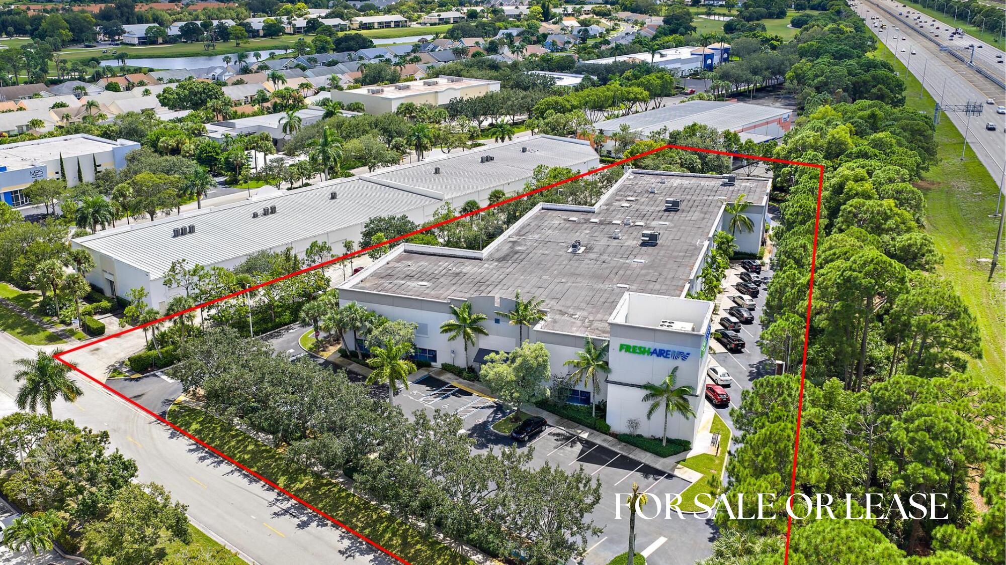 3126 Jupiter Park Drive Jupiter, FL 33458 - Photo 1 of 34 an aerial view of a city